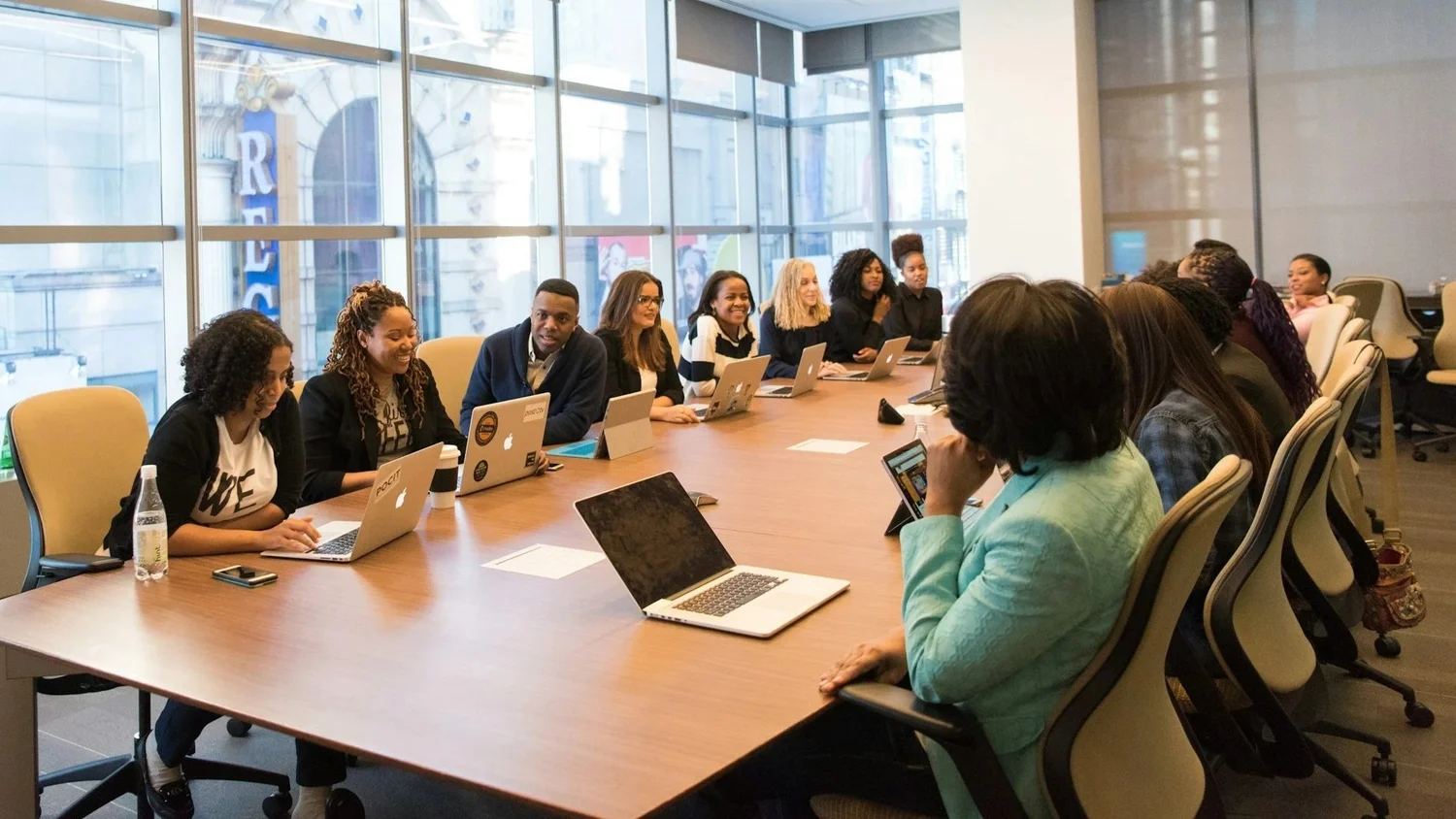 Boardroom session with fifteen leaders