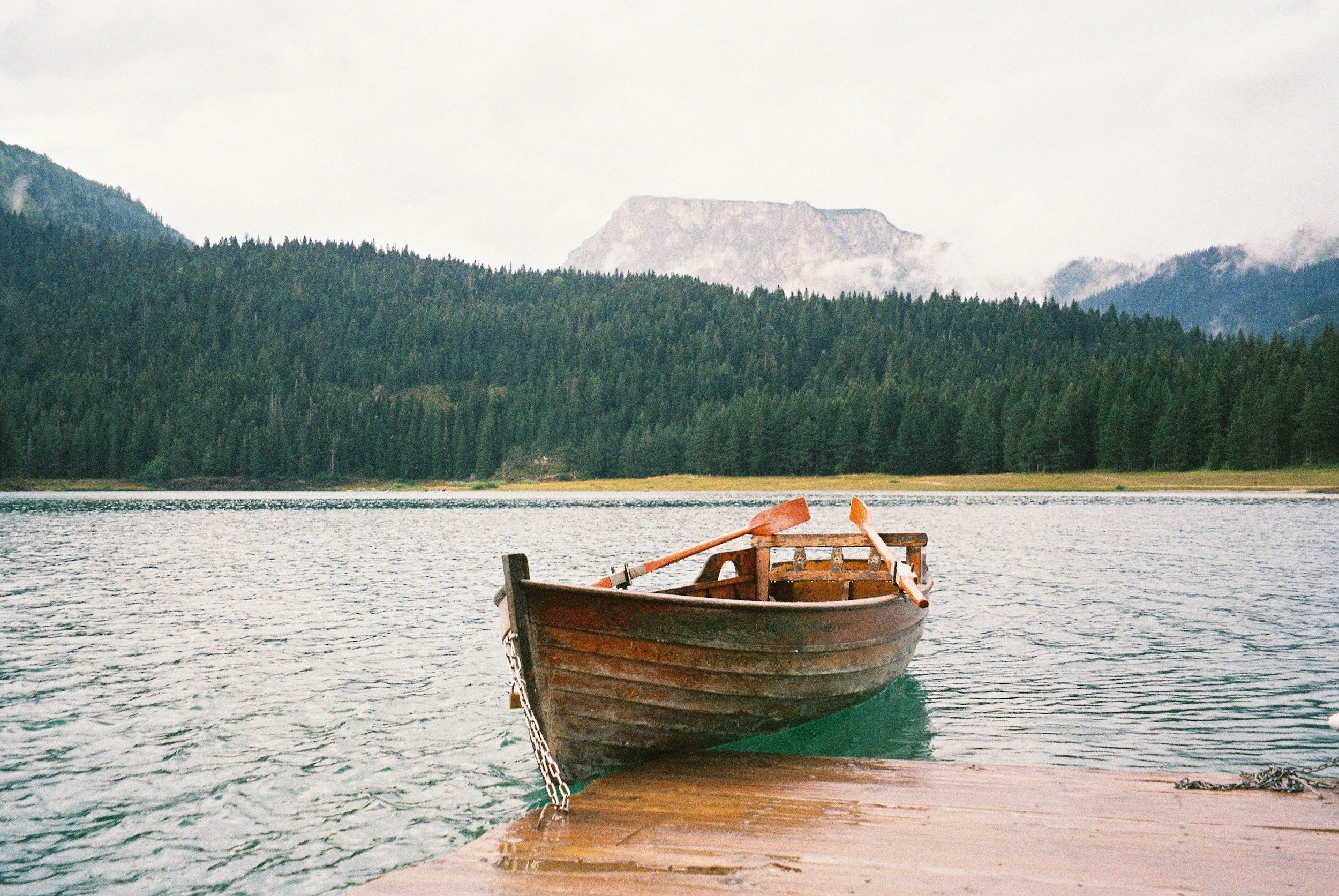A boat on open water, visual cue for our boat rocker philosophy